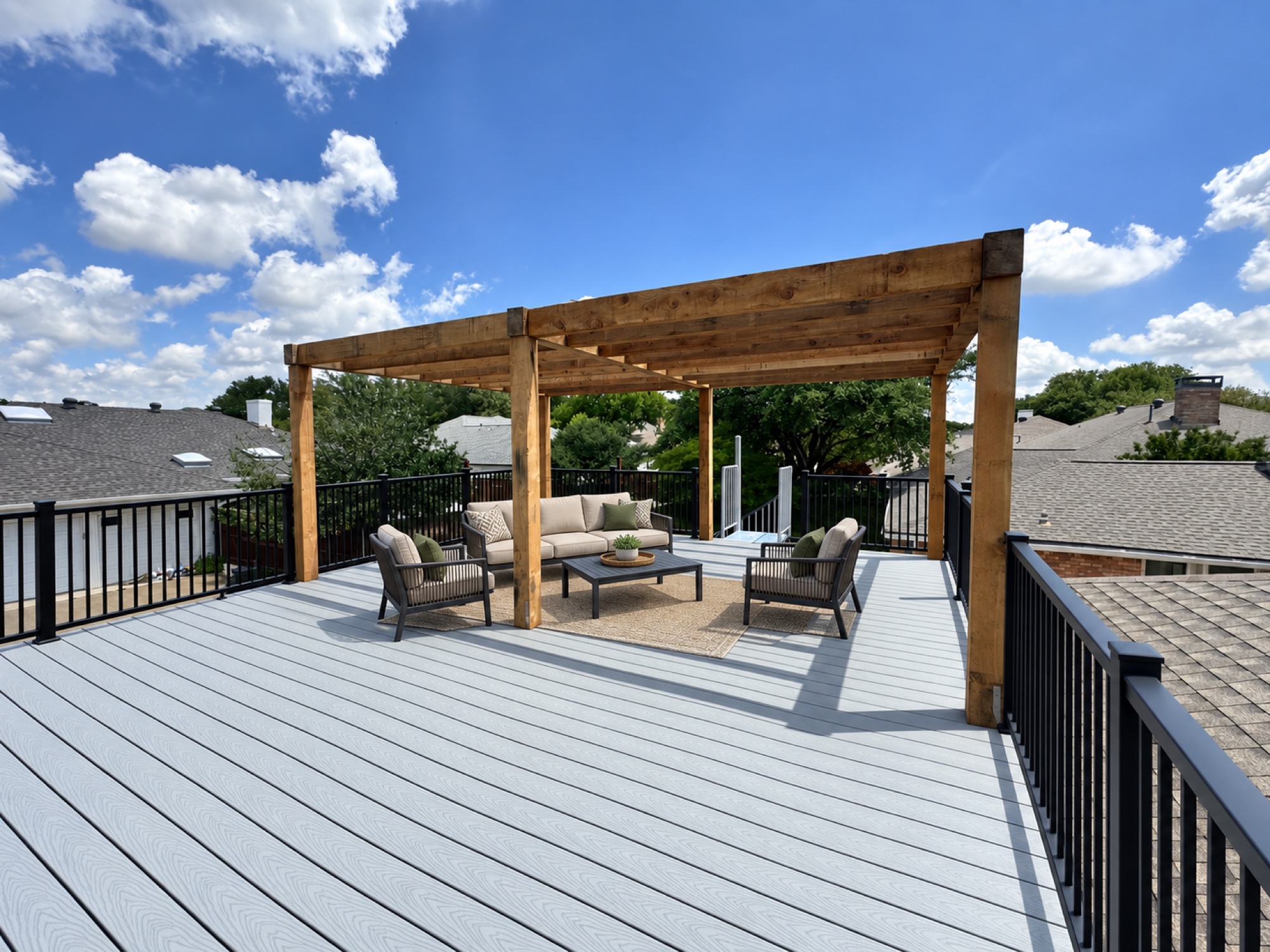 Visualization of an elevated deck with a wood pergola, black metal railing, and outdoor lounge furniture