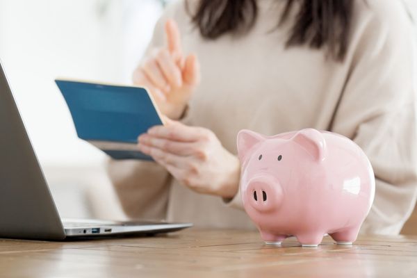 Woman checking financing for planned expenses